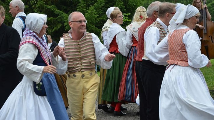 People dressed up for the midsummer festival in Sweden. People dressed up for the midsummer festival in Sweden.