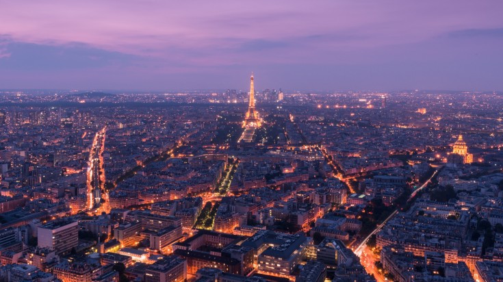 View of the city of Paris at dusk with Eiffel Tower in the Center