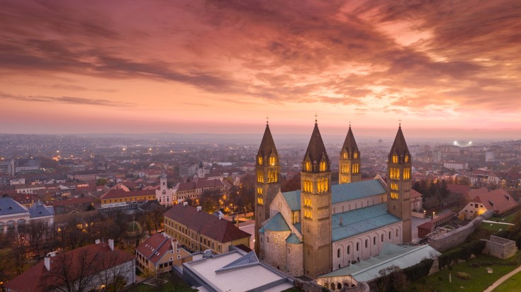 Church at Pecs with a red sky above.