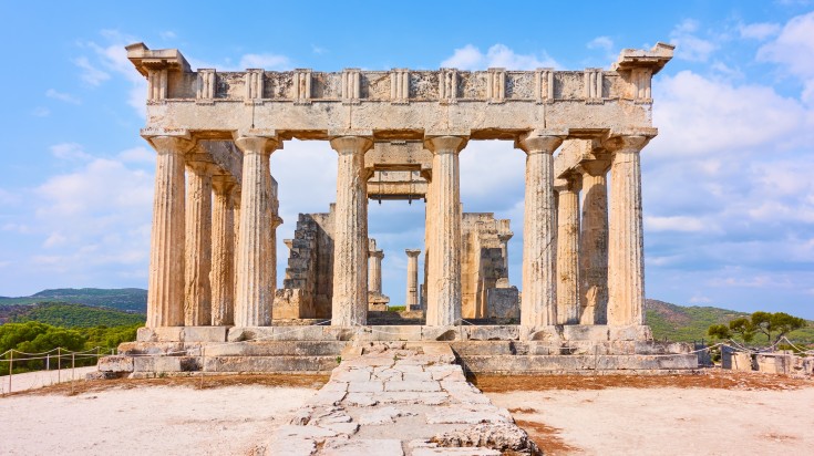 The ruins of Temple of Aphaia in Aegina Island on a sunny day. The ruins of Temple of Aphaia in Aegina Island on a sunny day.