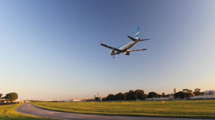 A plane landing in Buenos Aires airport.