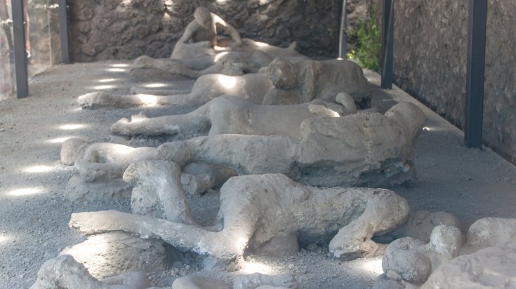 The twisted figures were created by pouring plaster into gaps where human remains were once found. The plaster casts of victims of Pompeii