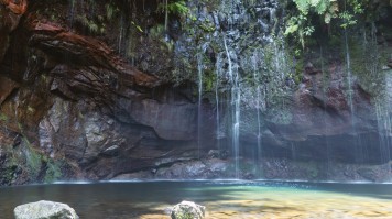 The 25 water fountains and the turquoise pool at its bottom as seen on a Madeira hike in Portugal