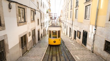 Portugal in February sees a blend of sunny and gloomy days, with mild and pleasant weather. Trams in Lisbon city