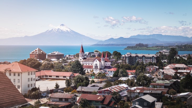 aerial view of Puerto Varas with Sacred heart Church and Osorno Volcano.