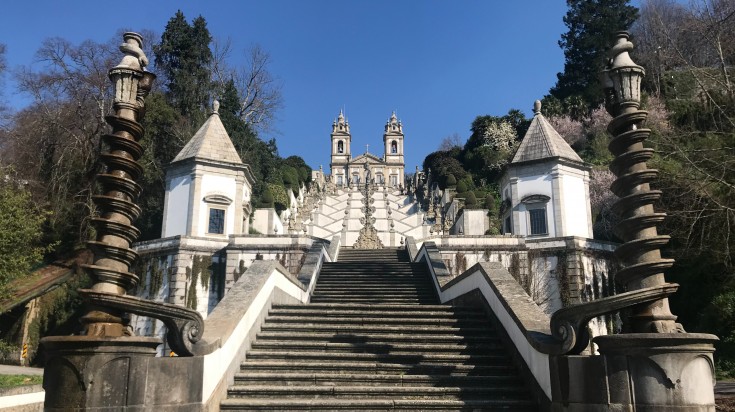 Jesus do Monte Shrine sits high on top of a forested mountain in the outskirts of Braga, Portugal. A magnificent baroque staircase leads up the mountain to the shrine. Jesus do Monte is a Catholic shrine located in Braga
