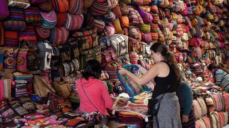 Head to markets like this in Peru to pick up some souvenirs.