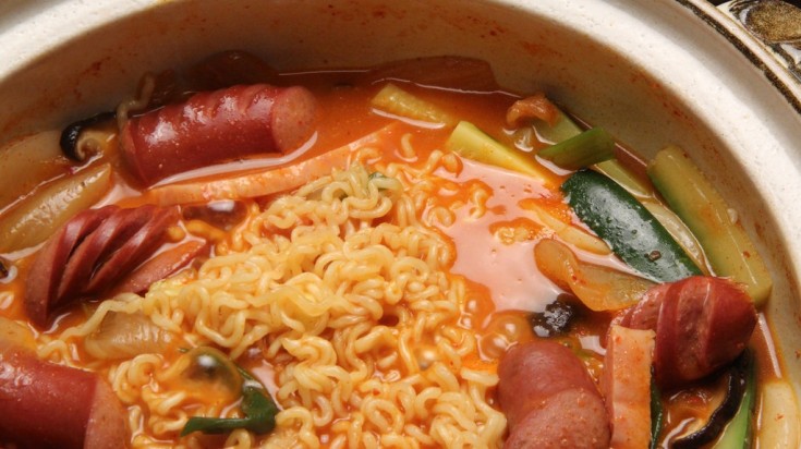 Budae Jjigae is a Seoul street food that is cooked with sausages and ramen