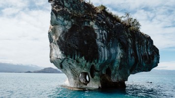 Uncover some of Chile’s hidden gems — stop off to visit sleepy lakeside towns like Puerto Tranquilo, kayak the General Carrera lake to witness the Marble Caves, appreciate stunning landscapes and marvel at exquisite viewpoints. A huge rock island in the middle of a lake