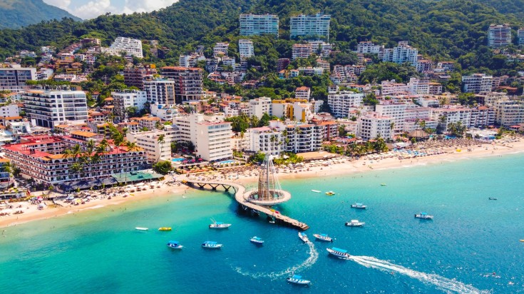 Speed boats and skyscrapers in Puerto Vallarta.