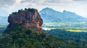 Sigiriya Lion Rock is a 660 feet tall rock formation in Sri Lankan tropical forest Sigiriya Lion Rock Sri Lanka