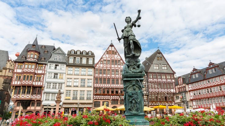 Statue of Lady Justice during spring.