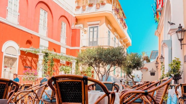 Enjoy a delicious meal at one of the street cafes in CapriOne of many cute cafes on the street of Capri. One of many cute cafes on the street of capri.