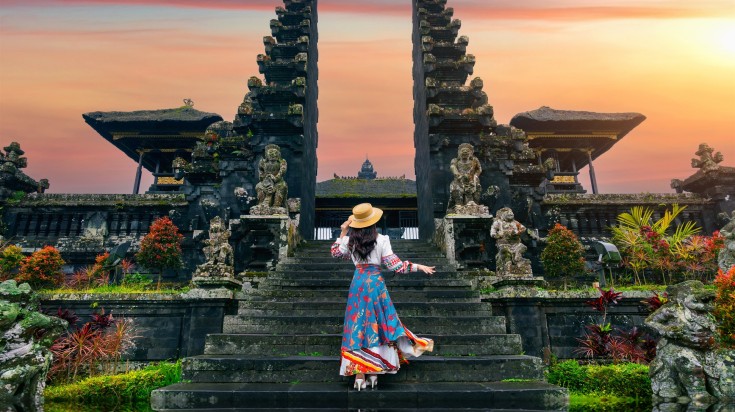 A woman tourists exploring Besakih temple, which is one of the top things t