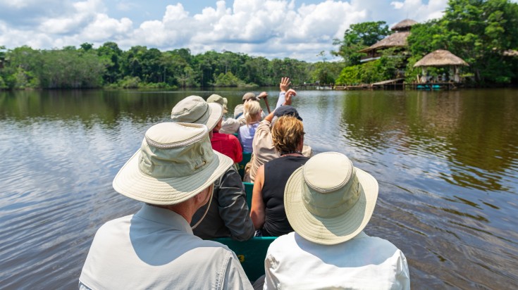 A tourist group on a canoe ride in the Amazon.