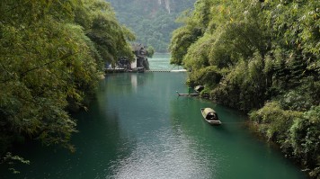 Small boat near the Three Gorges Dam which is the biggest dam in the world