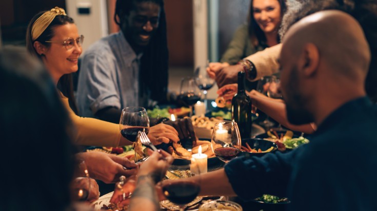 Tourists in Belgium enjoy hearty Belgian hot dishes together in February.