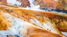 Group of hikers going up the path at Landmannalaugar, Laugavegur trek, Iceland. Landmannalaugar one of the most Icelandic looking places in the world