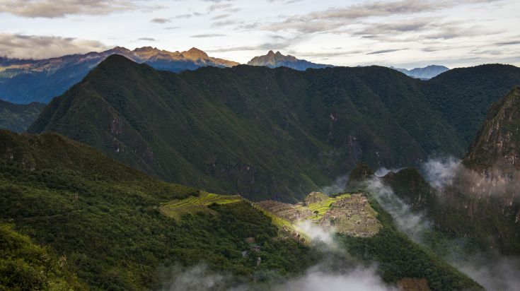 Salkantay Trek in Peru allow you glimpses of Machu Pichhu.