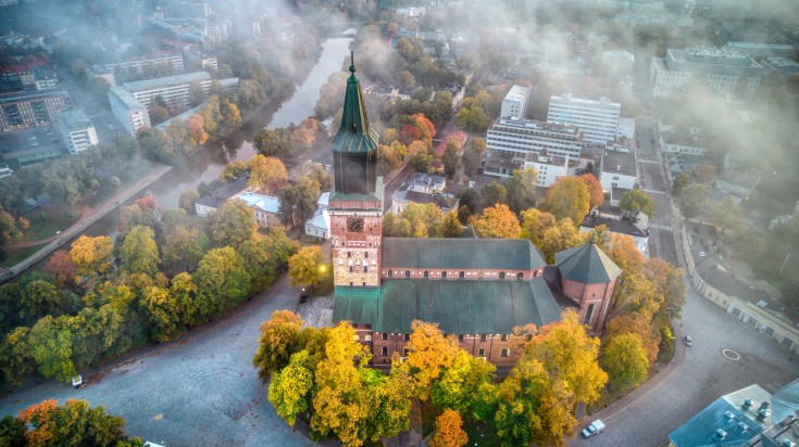 Aerial view of Turku Cathedral, one of the best places to visit in Finland on a foggy day. Aerial view of Turku Cathedral, one of the best places to visit in Finland