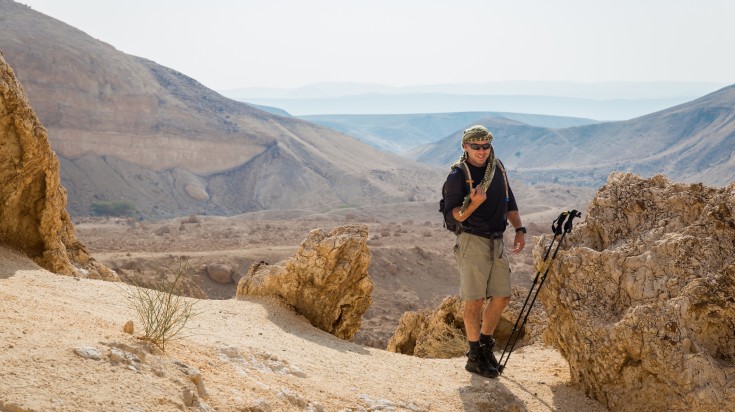 A hiker posing in the middle of Umm Qais and Ajloun Forest Reserve trek.