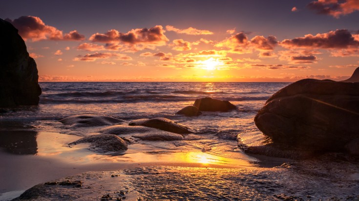 Uttakleiv Midnight Sun, Lofoten, Norway in May.