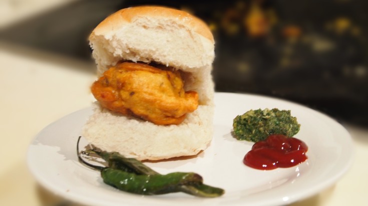 Vada paav served with chilies and pickle.