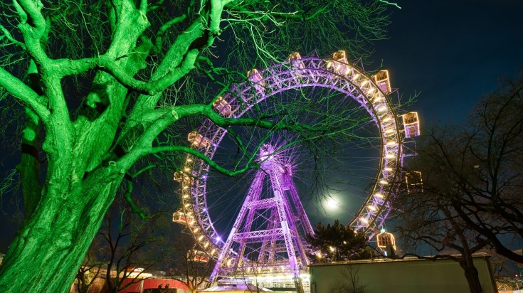 Wiener Riesenrad lit up at night.