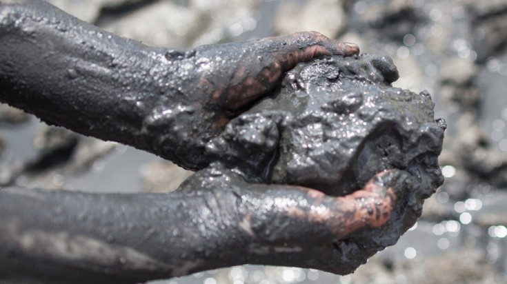 A hand full of volcanic mud. A hand full of volcanic mud.