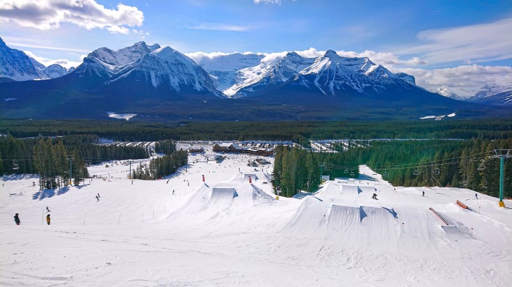 Wide view of snowboarding park in a ski resort in Banff in Canada in November.