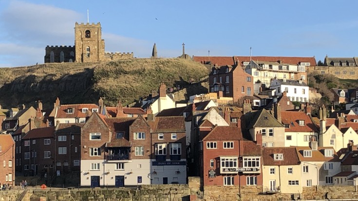 Neatly built houses after rain on Whitby, England in February.