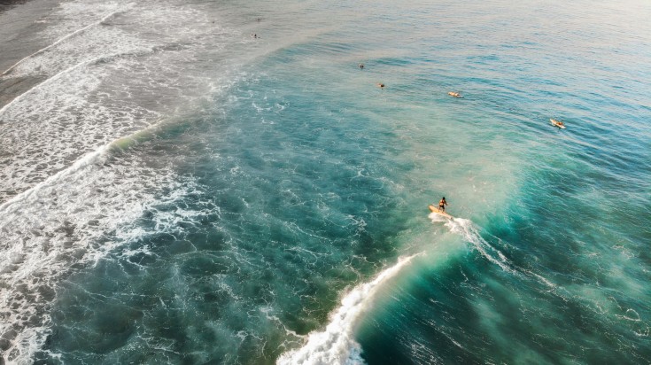 Surfers at San Juan La Union in the Philippines in September.