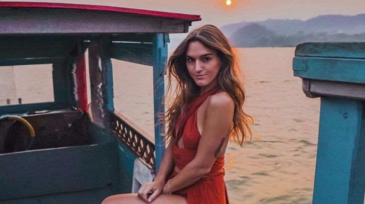 Alexandra on a boat ride during sunset.