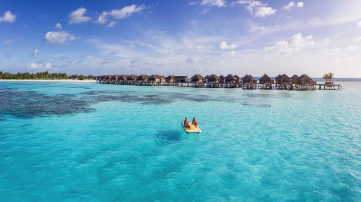 Women on a pedalo boat ride in the Maldives during December.