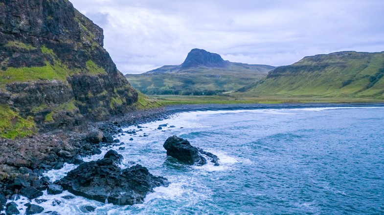 Visit Talisker Bay at sunset while spending 5 days in Scotland.