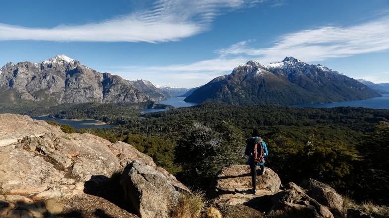 The beauty of Bariloche and the abundant outdoor activities in the region meet the expectations of the visitors. Woman contemplates the landscape, circuit boy, Bariloche in Argentina in October.