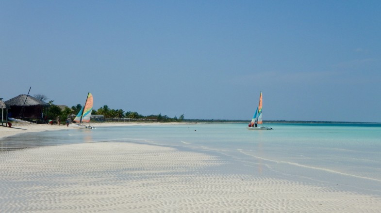 Boats in the shallow waters of Cayo Coco during summer in Cuba.