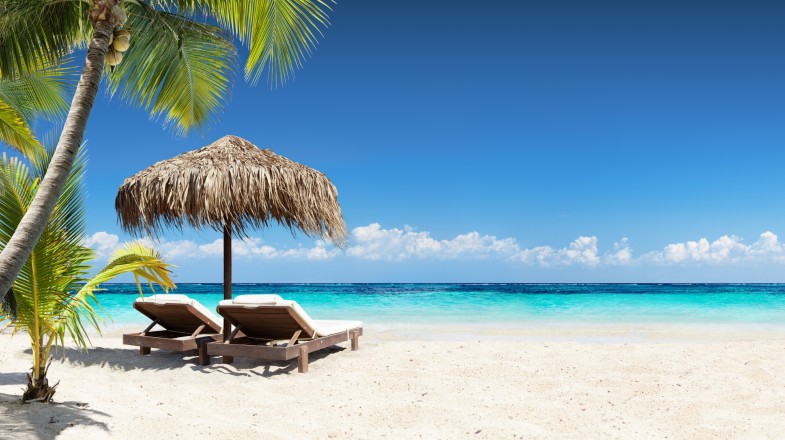Chairs placed under an umbrella in the Maldives in January.