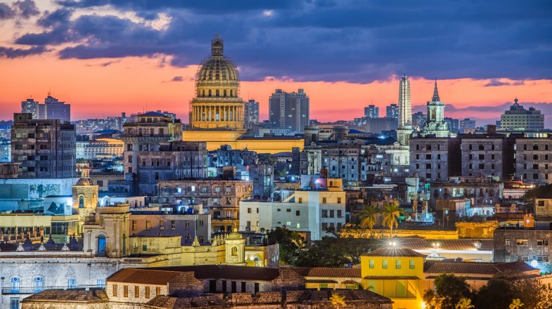 Visit the largest city in the Caribbean reminiscent of Spanish architecture in Cuba during July View of the old town skyline in Havana, Cuba in July