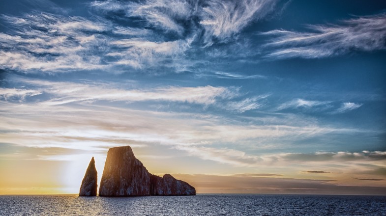 Watch the sunset at Kicker Rock in Ecuador in February.