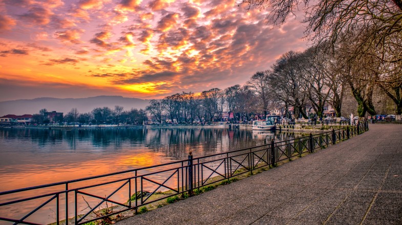 View at lake Pamvotis during sunset Ioannina city, Greece in December.