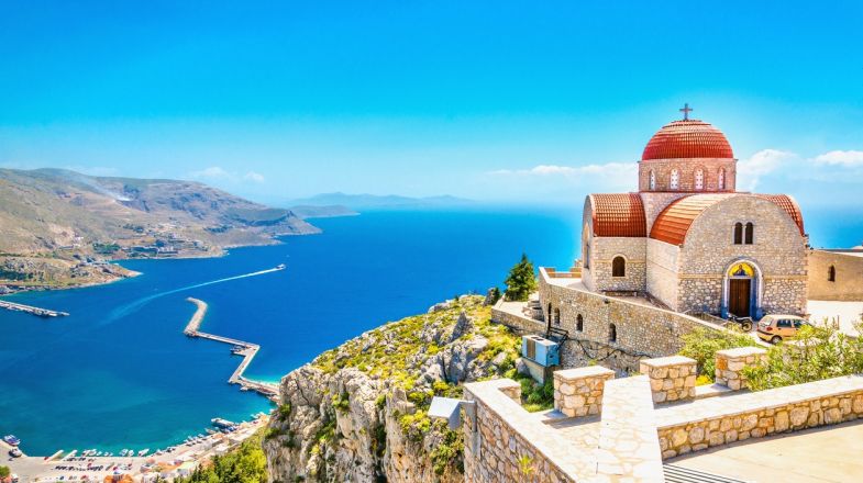 A holiday in Greece includes visit to ancient ruins, white sandy beaches and taste of delicious Mediterranean cuisine.