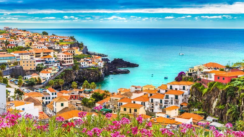 The white-washed coastal towns of Madeira sit next to blue vast sea, but getting to Madeira is no longer possible via waterways.