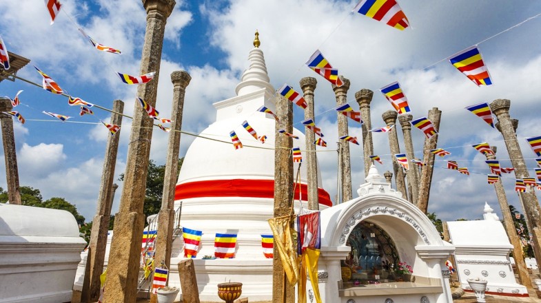 Buddhist prayer flags in Thuparama dagoba in Anuradhapura as seen in Sri Lanka during June