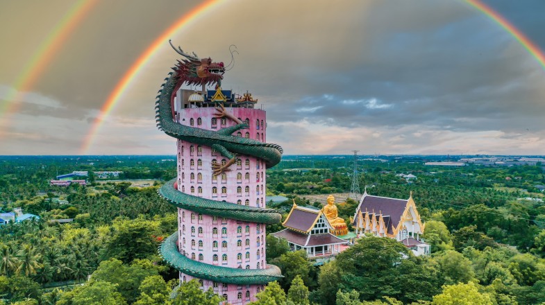Dragon temple during rainy season in Wat Samphran in Thailand in September.