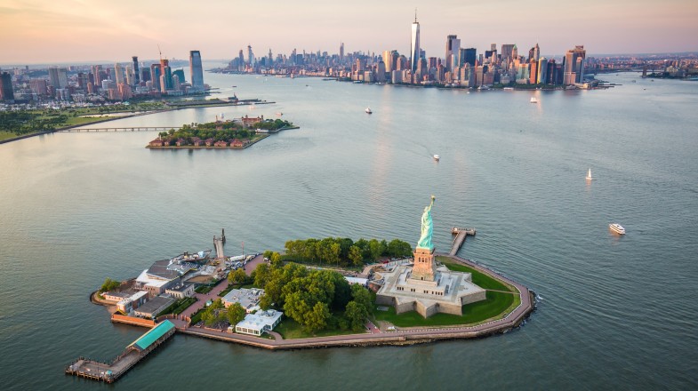 An aerial view of New York City and the Statue of Liberty. These are two of the best things to do in the USA.