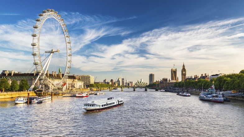 Westminster Parliament, Big Ben and the Thames with blue sky in England.