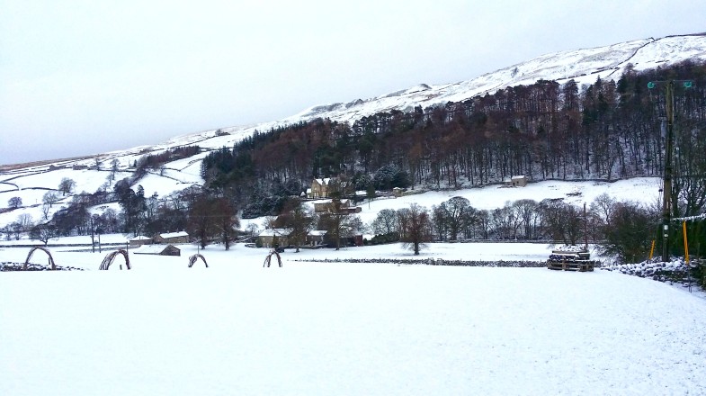Snow-covered landscape in Yorkshire during winter in England.