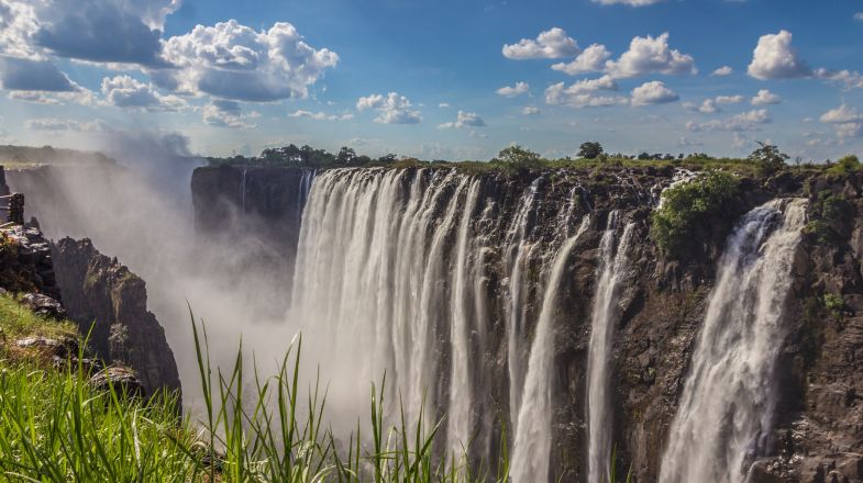 A trip to Zambia will open you to untouched wilderness and unparalleled natural beauty, including Victoria Falls.